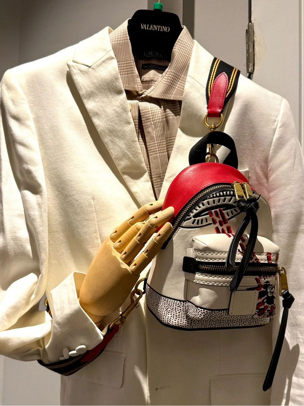 Coach & Disney mini backpack Red & Cream Keith hearing special edition.